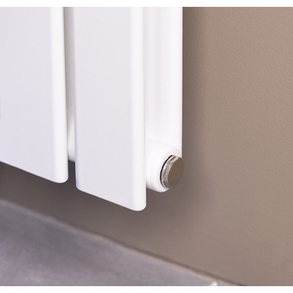 Bouchon mâle installé radiateur blanc