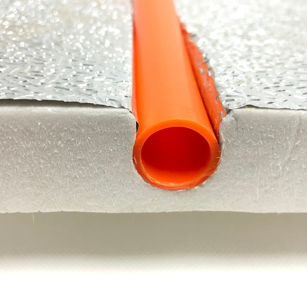 Intégration du tube dans dalle plancher chauffant sec