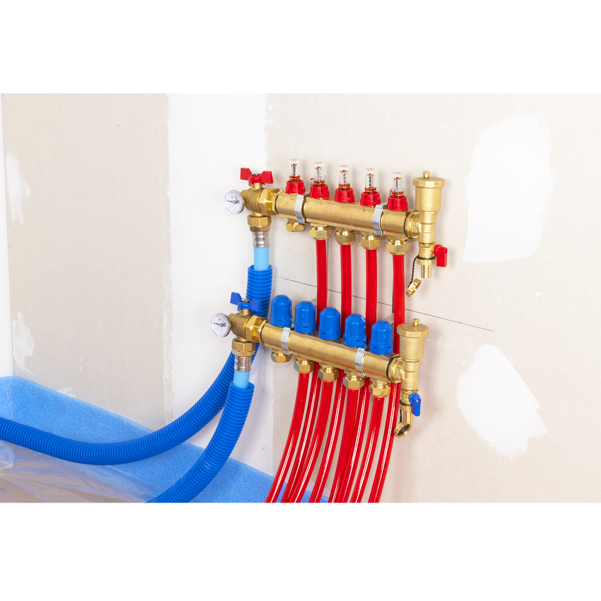 Pose du Débitmètre sur le collecteur plancher chauffant