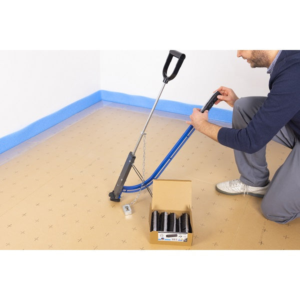 Chargement de l'agrafeuse plancher chauffant