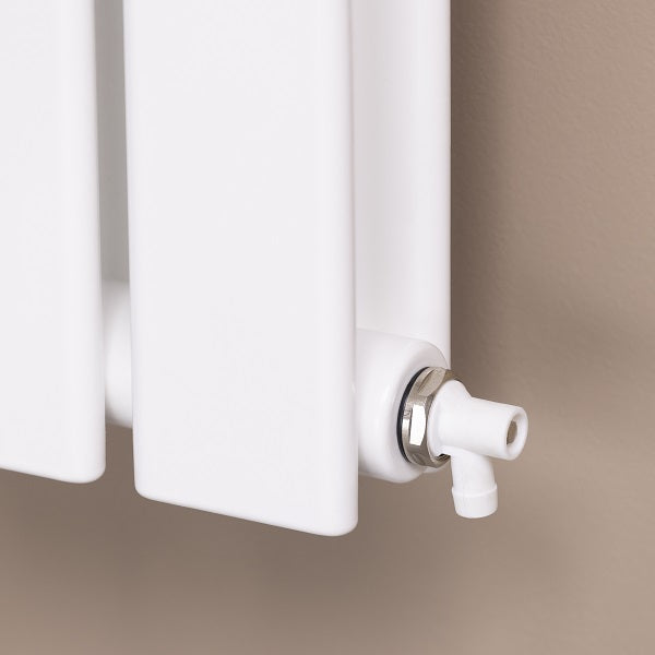 Robinet de Vidange Radiateur à Bec installé radiateur blanc